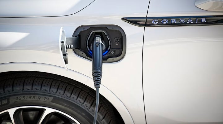 An electric charger is shown plugged into the charging port of a Lincoln Corsair® Grand Touring
model. | Gary Yeomans Lincoln in Daytona Beach FL